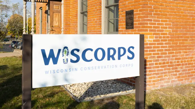WisCorps Wisconsin Conservation Corps sign on a brick building