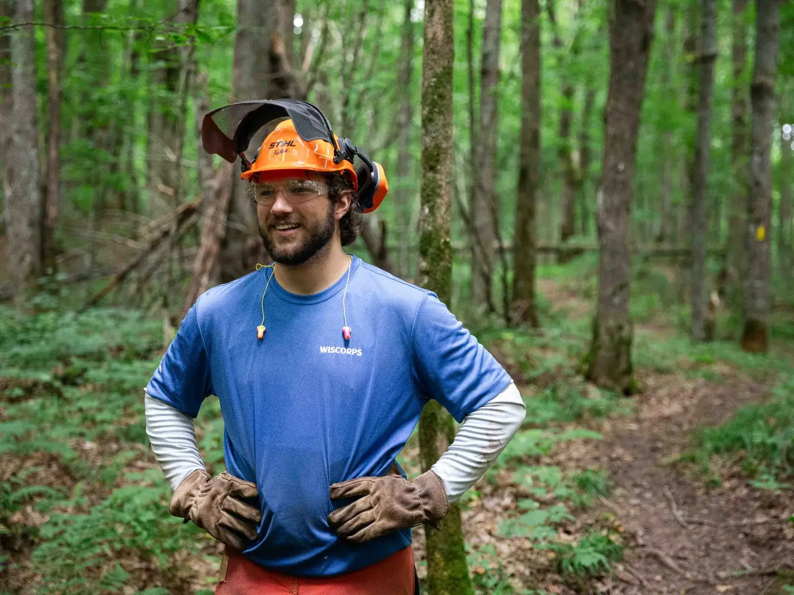 A WisCorps crew leader on the trail